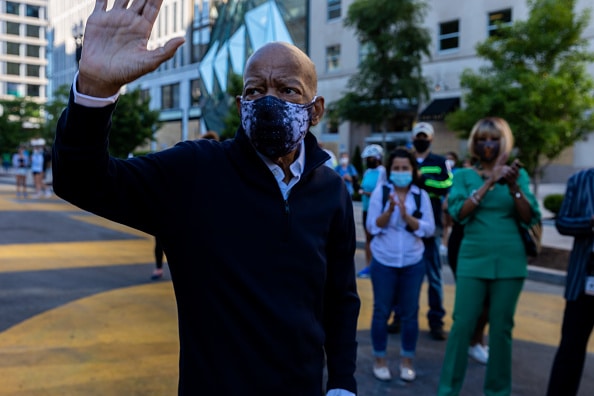 Black Lives Matter Plaza Washington, D.C. Congressman waving at people on the street