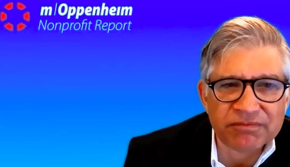 man with glasses looking at camera