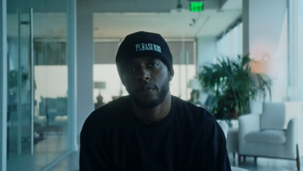 Man with black beanie looking at camera