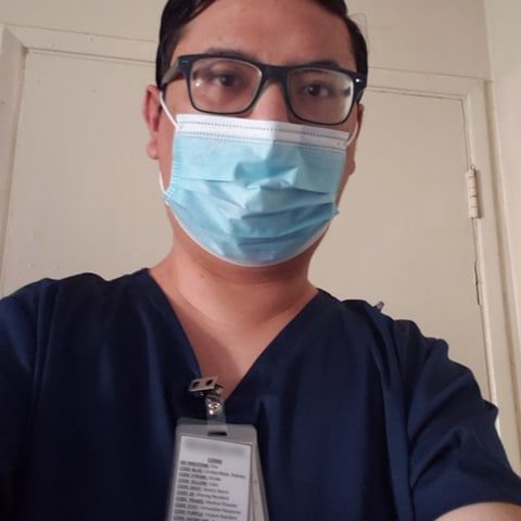 Kannavie Man in glasses wearing a mask